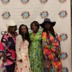 Annual Tea Party 2017 — four guests posing together