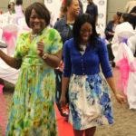 Annual Tea Party 2017 — two women in colorful dresses