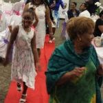 Annual Tea Party 2017 — young girl and woman walking together