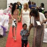 Annual Tea Party 2017 — guests walking red carpet indoors