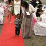 Annual Tea Party 2017 — child walking red carpet
