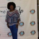Annual Tea Party 2017 — guest at branded backdrop