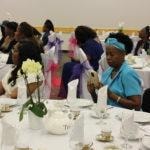 Annual Tea Party 2017 — guests seated at elegantly set tables