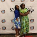 Annual Tea Party 2017 — two guests posing together