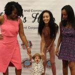 Annual Tea Party 2017 — group with baby at backdrop