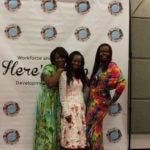 Annual Tea Party 2017 — three women posing at Here's Help backdrop