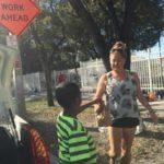 Volunteer helping community member