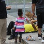 Family receiving assistance at outreach event